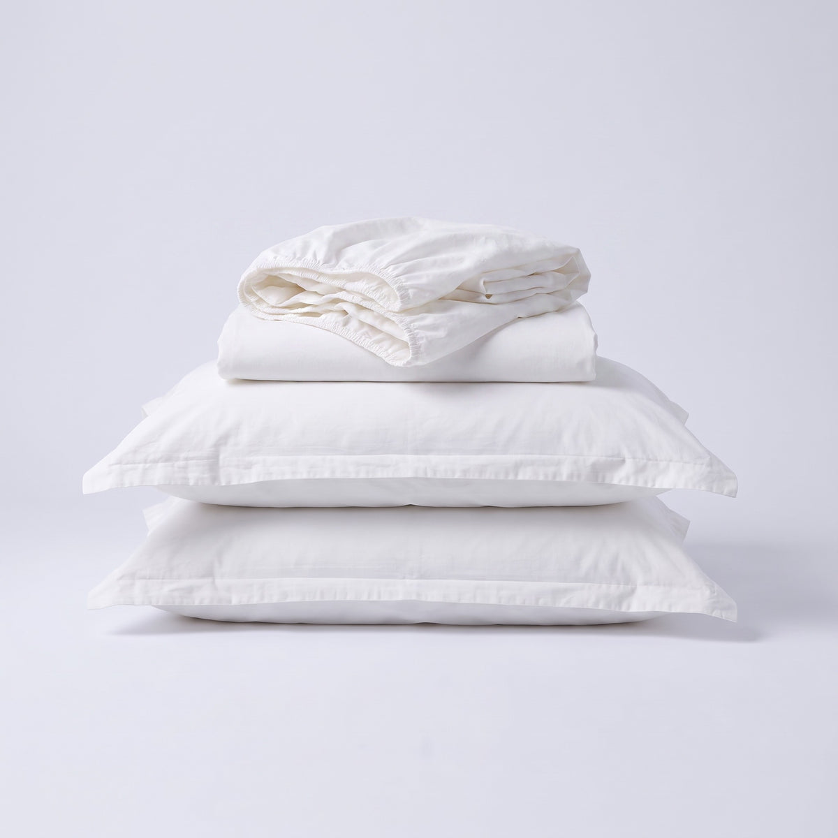 Set complet lenjerie TENCEL™ percale în snow white: husă de pilotă, cearșaf cu elastic și două fețe de pernă